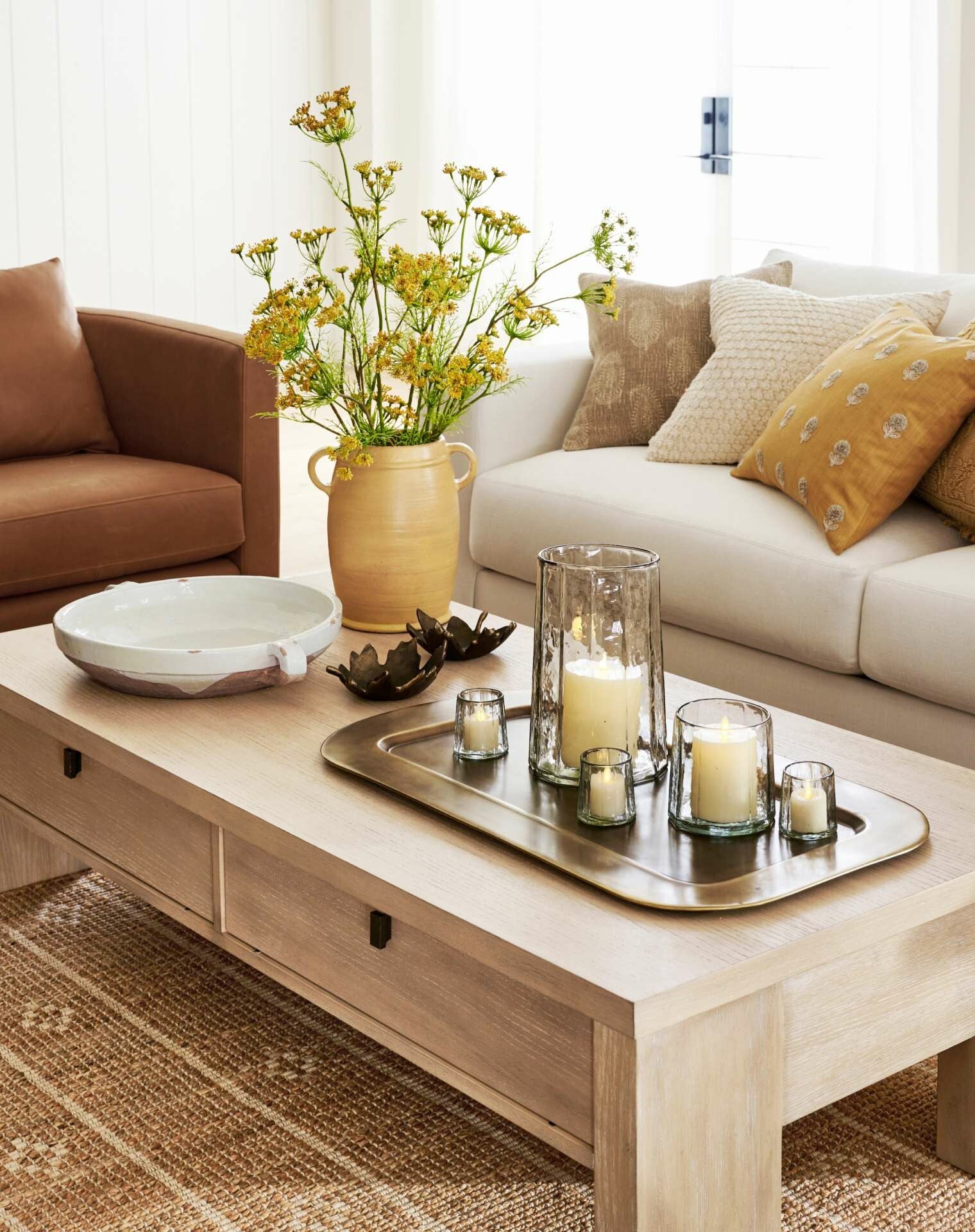 image by Pottery Barn containing Furniture, Couch, Table, Property, Plant