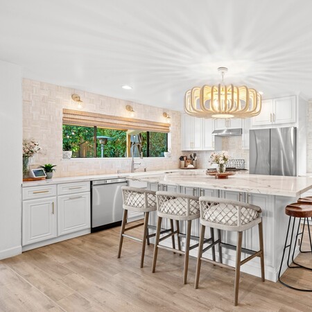 Powder coated metal frame wrapped with tiny hand-sewn coconut