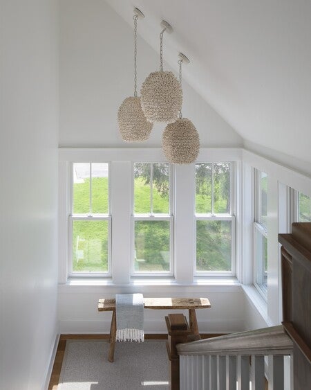 Hand-sewn wood beads accented with tiny glass beads over a