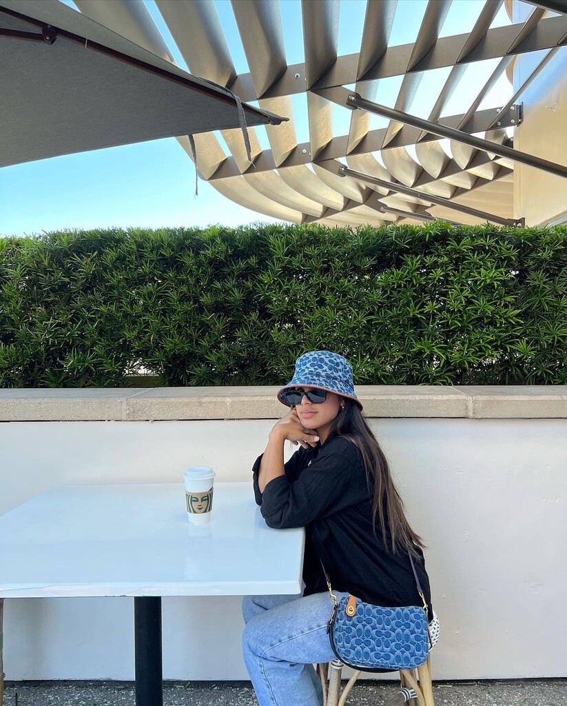 COACH® | Swinger Bag In Signature Denim