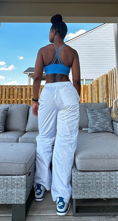 Nike Windrunner Women's High-Waisted Woven Open-Hem Trousers. Nike CA