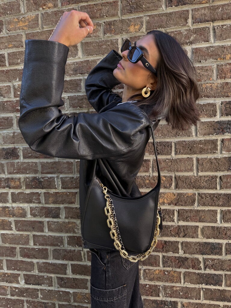 COACH® | Curve Zip Bag