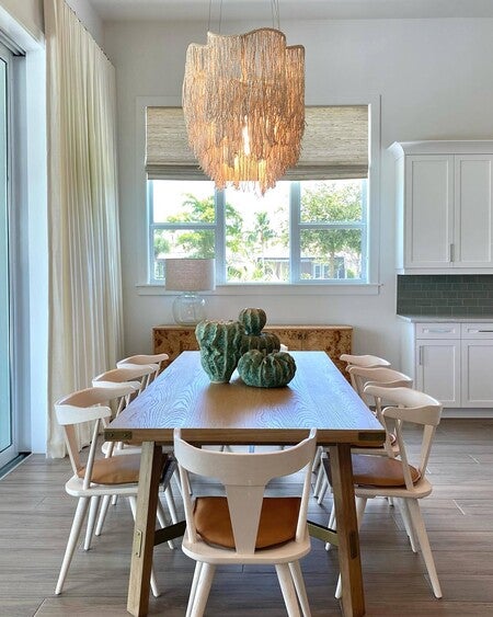 Strands of tiny wood beads in a cream finish embellished with