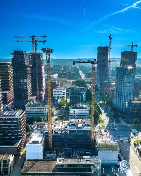 image by anonymous containing building, city, skyscraper, build, crane