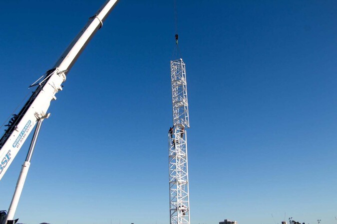 image by liebherrtowercranes containing crane, tower, lift, sky, rocket