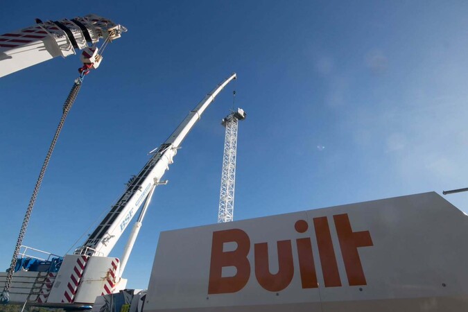 image by liebherrtowercranes containing crane, sign, lift, job, sky