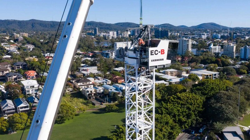 image by liebherrtowercranes containing city, tower, crane, peak, lift