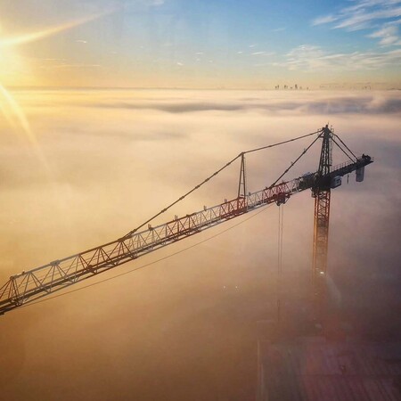 image by anonymous containing fog, crane, cloud, sky, sun