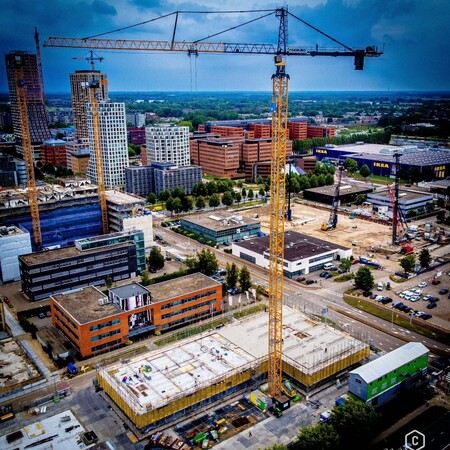 image by anonymous containing building, build, crane, city, construction site