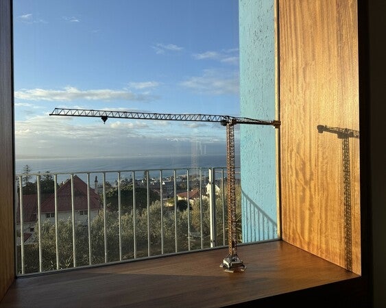 image by anonymous containing window, room, crane, balcony, sea