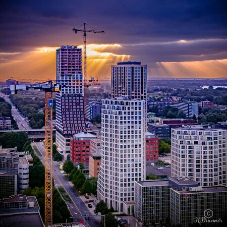 image by anonymous containing building, city, skyscraper, tower, crane