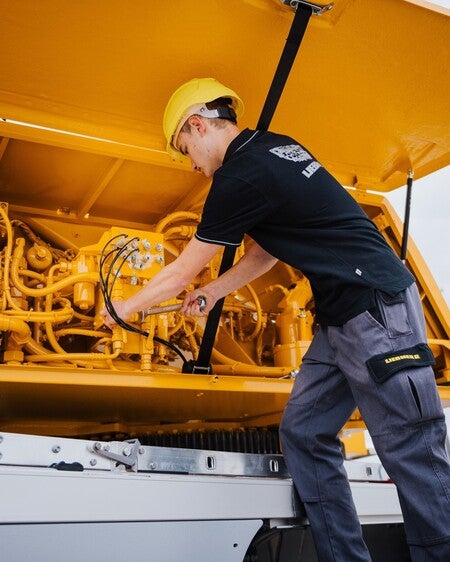 image by liebherrusa containing man, job, yellow, truck, engine
