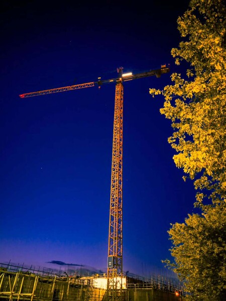 image by anonymous containing crane, night, tree, tower, build