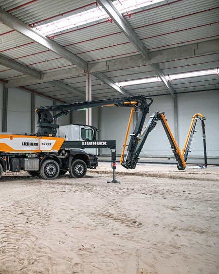 image by liebherrusa containing truck, crane, warehouse, building, park