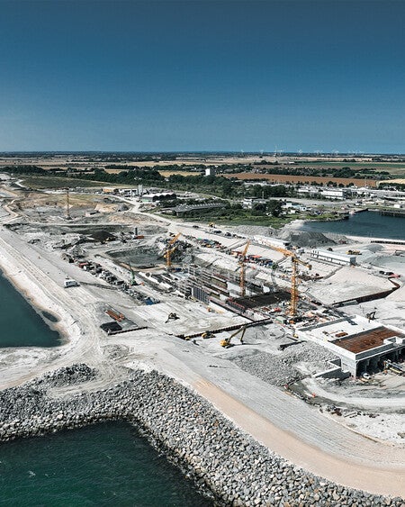 image by liebherrconstruction containing water, build, dock, harbor, construction site