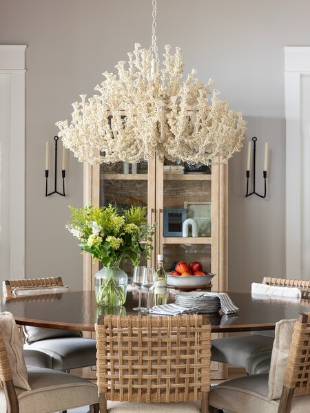 Fully beaded with tiny coco beads in a soft white finish