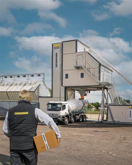 image by liebherrusa containing man, carry, walk, person, luggage