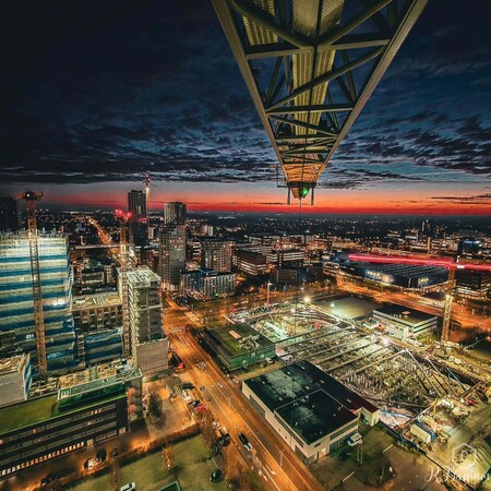 image by anonymous containing city, night, building, bridge, city skyline