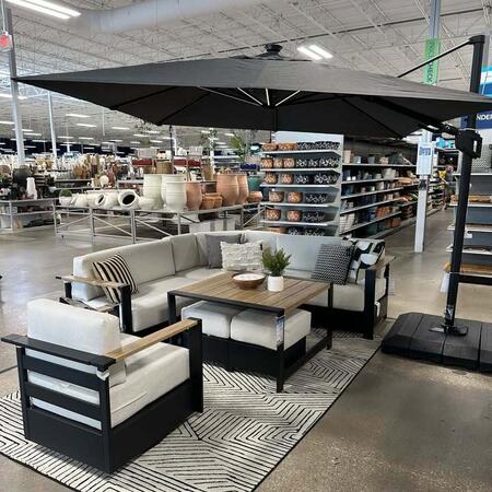 image by At Home containing umbrella, couch, store, furniture, table