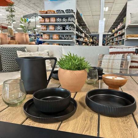 image by At Home containing table, bowl, plate, plant, black